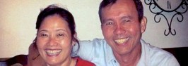 Two people with healthy smiles, showing what good dental treatments can do